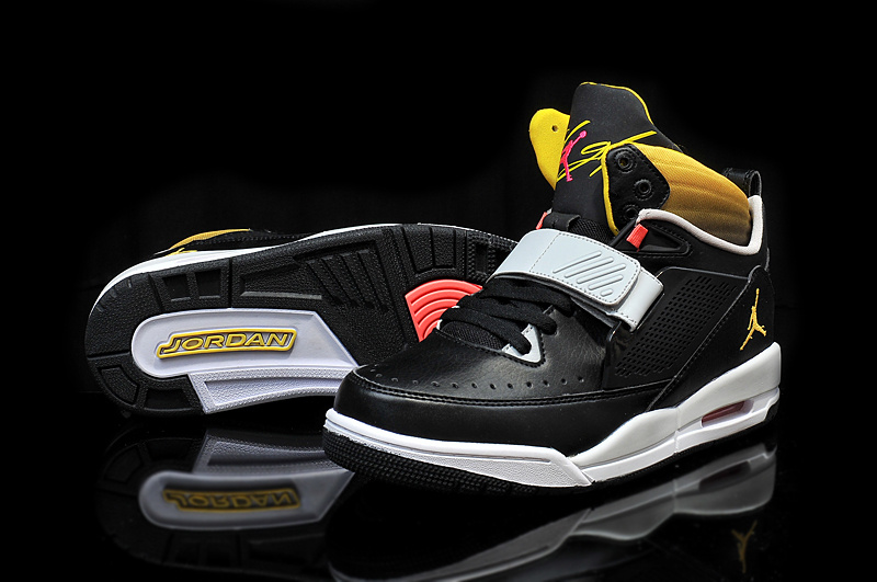 black and yellow flight jordans