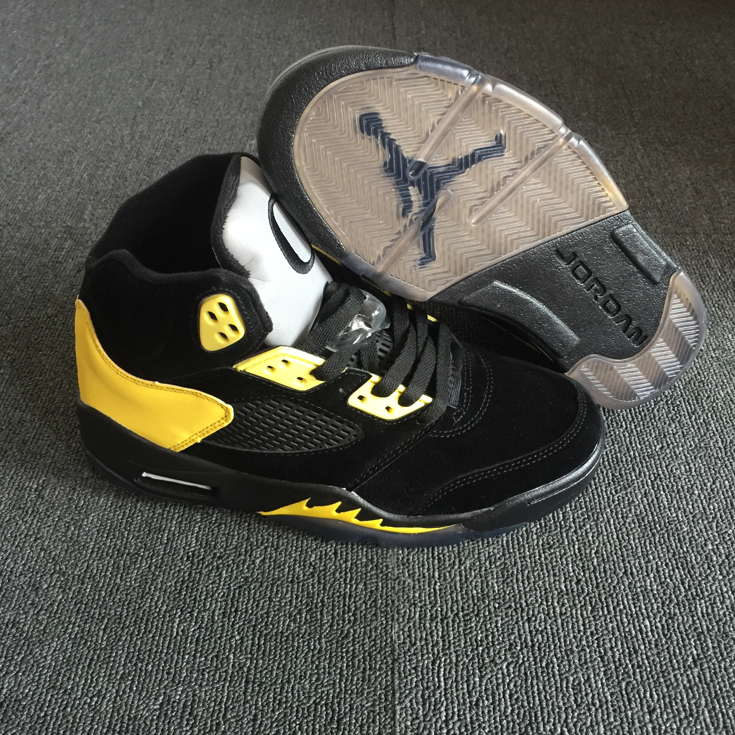 black and yellow jordans 5