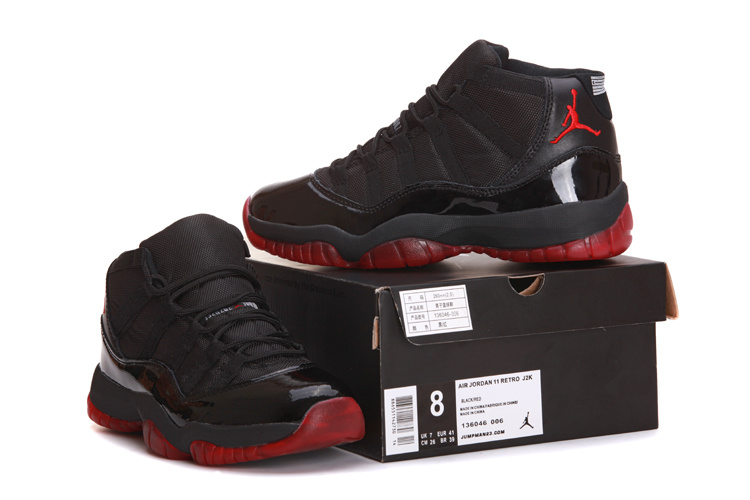 all black and red jordan 11