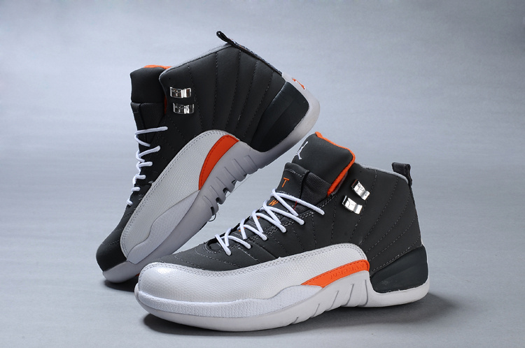 orange and white jordans 12