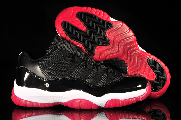 red black and white low top 11s