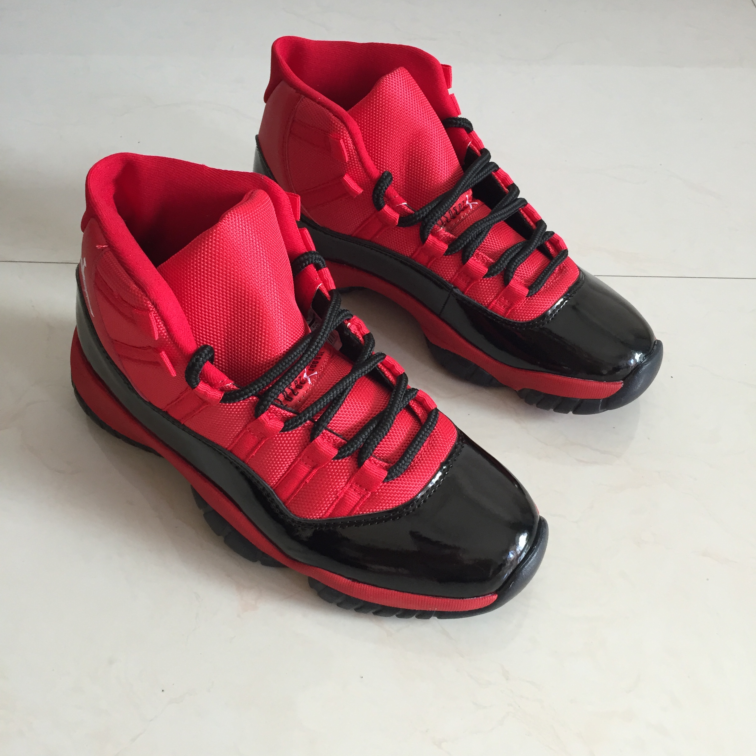 retro jordans 11 red and black