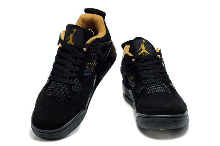 black jordans with gold logo