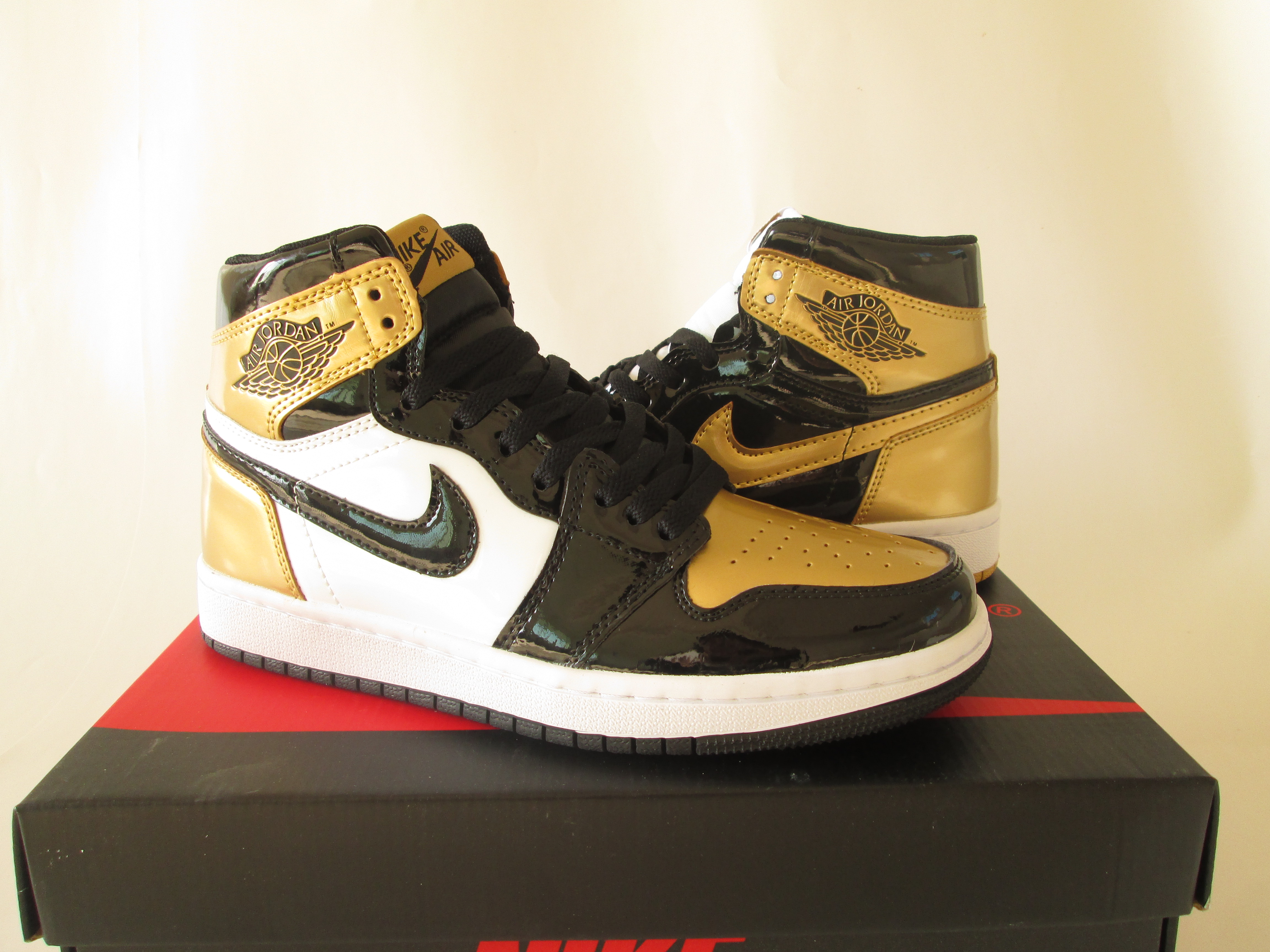 What The Jordan of Air Jordan 1 Black Gold White Shoes - Click Image to Close